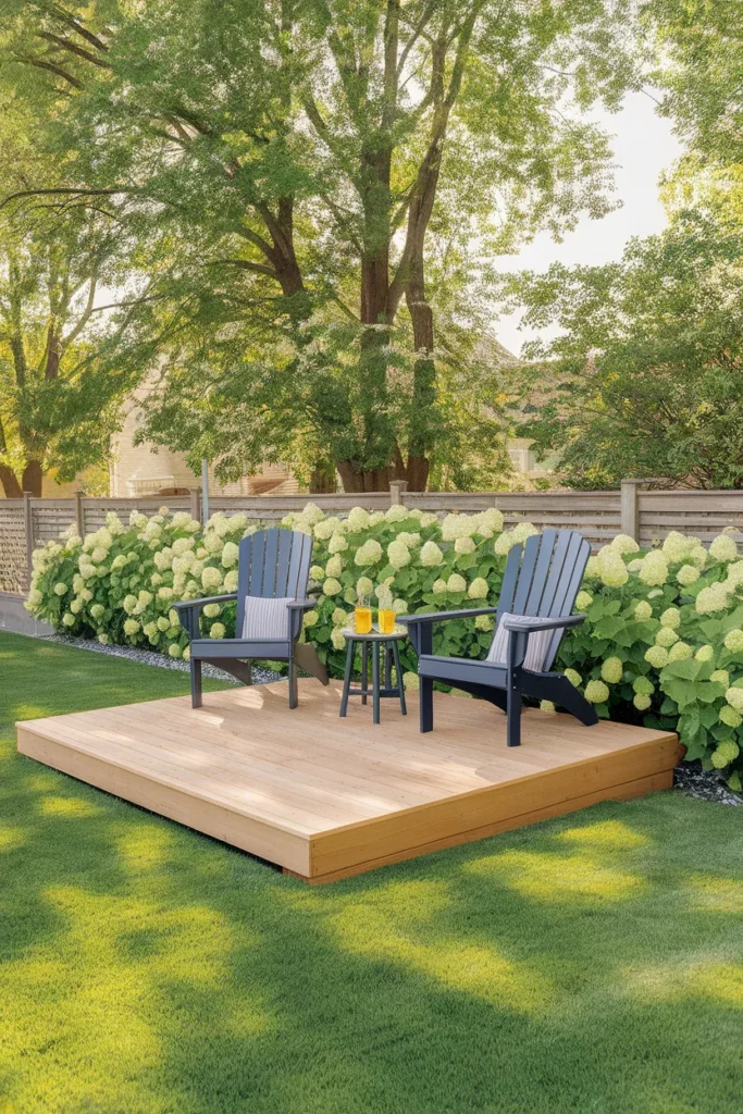 Floating deck ideas finished 10x12 freestanding deck with Adirondack chairs on a green lawn