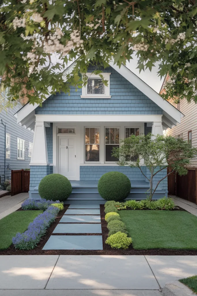 Small front yard landscaping ideas on a narrow lot with boxwoods and a bluestone walkway