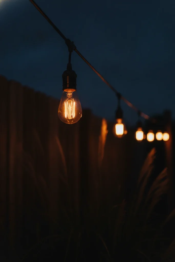 Boho outdoor lighting ideas start with one warm S14 bulb glowing at dusk