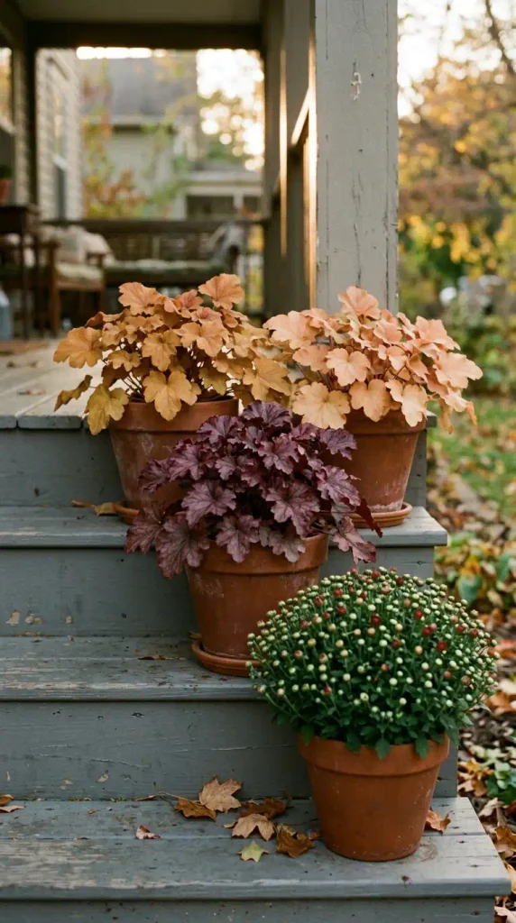 Fall shade decor ideas: caramel and burgundy heuchera pots on shady porch steps instead of mums